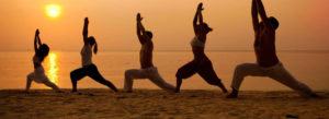 Yoga class on the beach